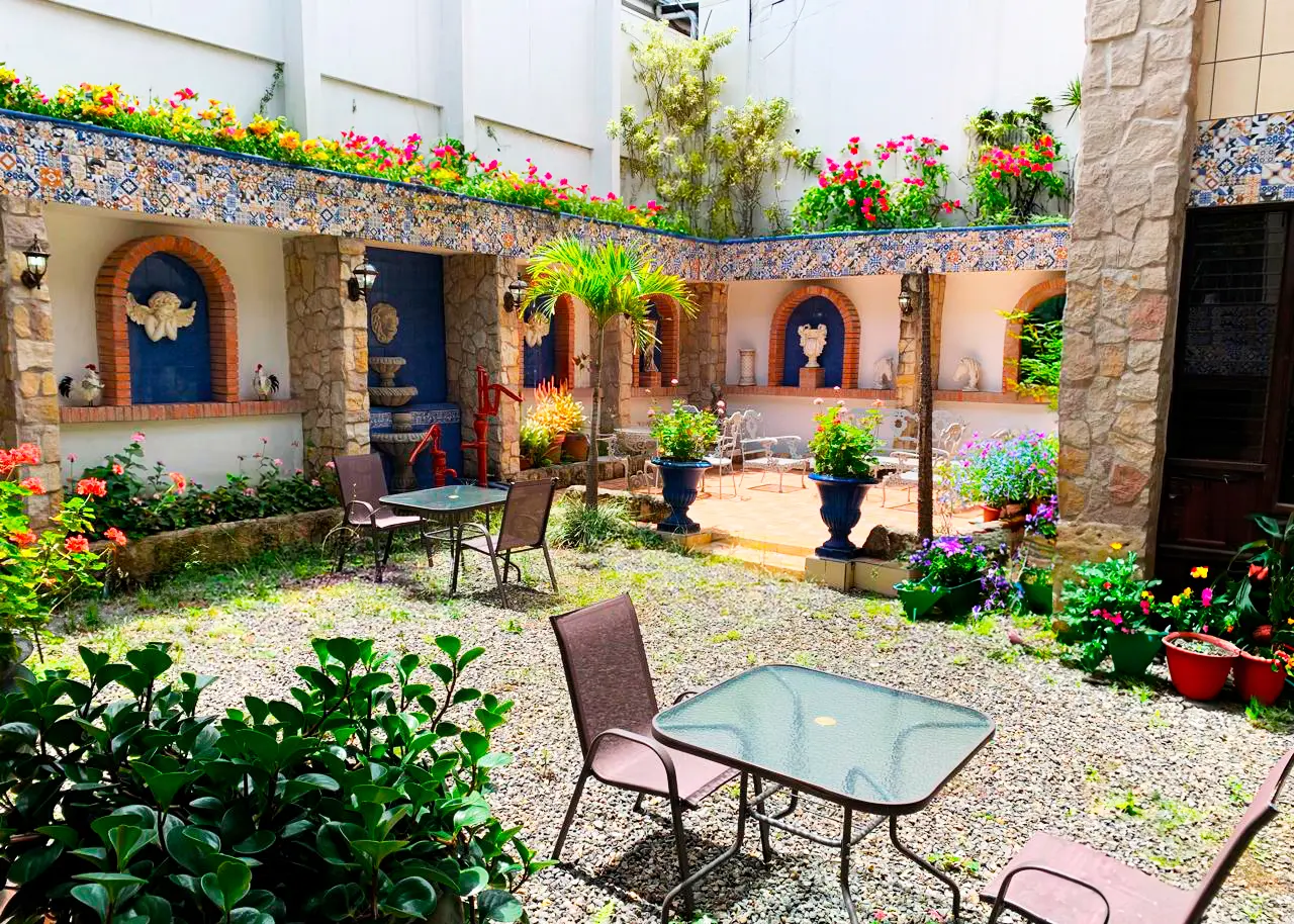 Patio and architectural tile details at Gran Casa Universitaria