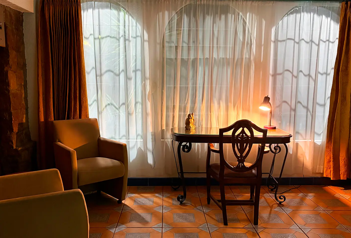 Desk and interior workspace at Gran Casa Universitaria